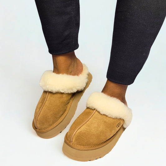  UGG Disquette chestnut suede slippers with 1-inch platform sole, sheepskin lining, and eco-friendly sugarcane EVA outsole 1