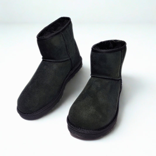 UGG men's Classic Mini black boot with twinface sheepskin and Treadlite outsole. 1