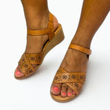 Gia Coconut Laser Cut Leather Wedge on foot