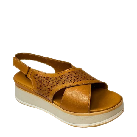 GIA laser cut platform sandal in coconut, right-facing studio side view