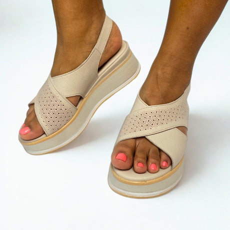 GIA laser cut platform sandals in grey worn on model